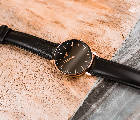 Iconic Women's Black and Gold Watch
